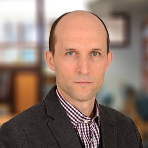 headshot of Huberto Ennis