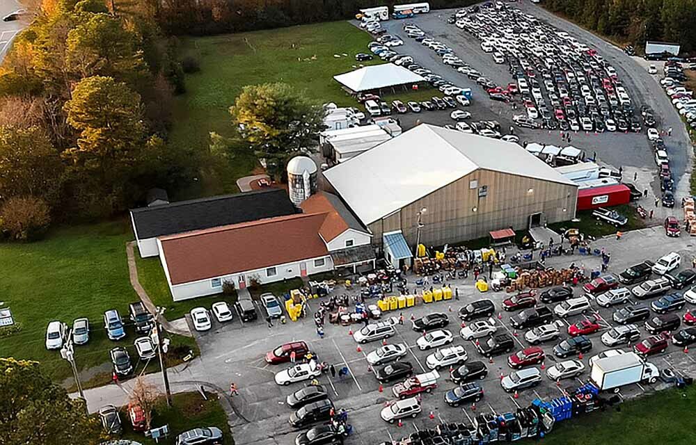 Overhead view of the Chesterfield Food Bank operating with a lot of cars lined up for assistance.