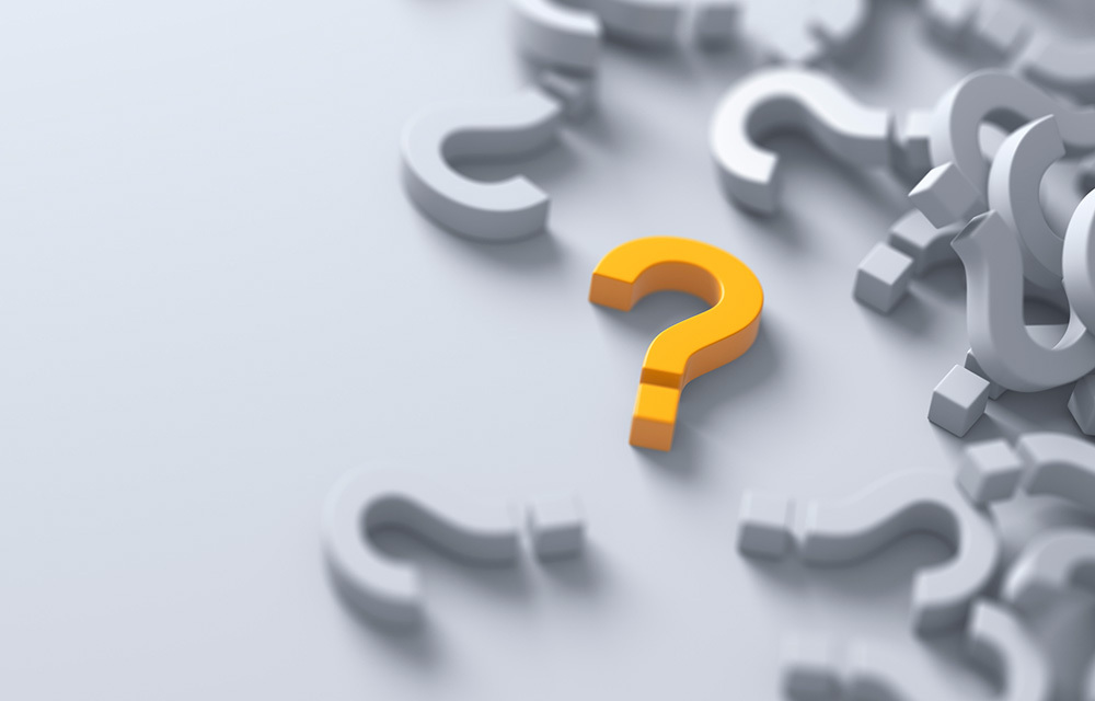 Stack of grey question marks with a bold, yellow question mark standing out.