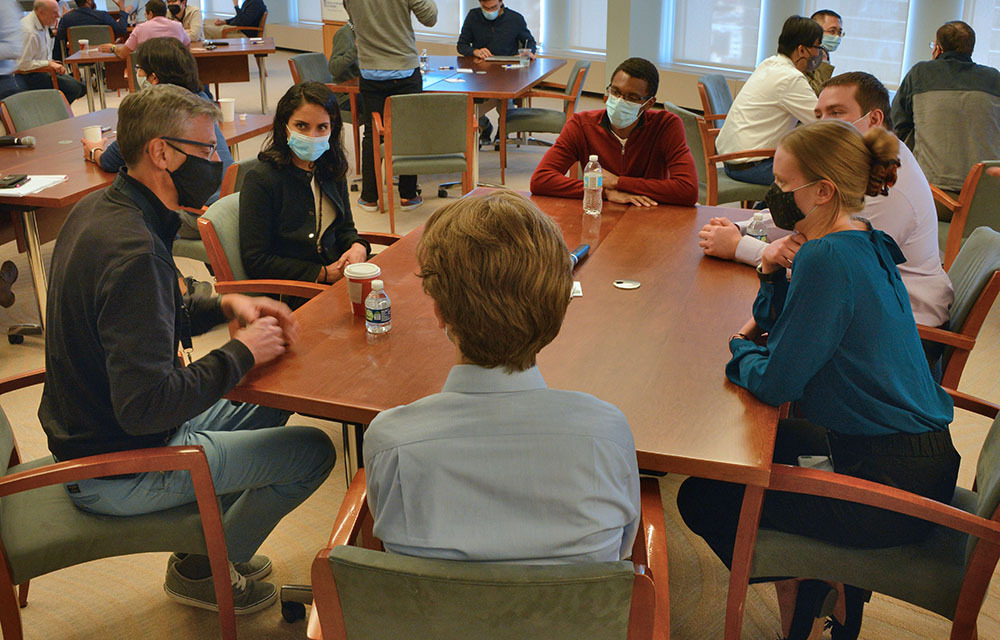 Collaboration at a table during CORE week