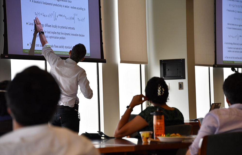 Esteban Rossi-Hansberg presenting the paper “The Spatial Effects of Carbon Policy in the European Union”