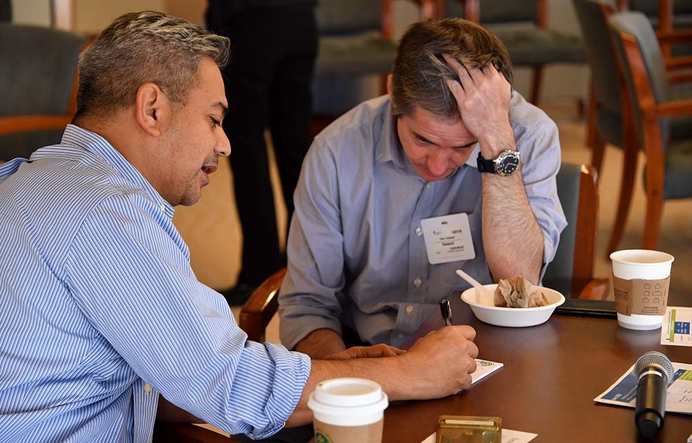 Economists working together between seminars