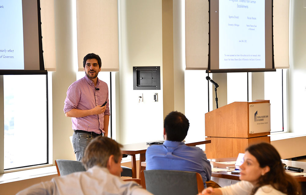 Nicolas Morales presenting the paper “Firm Heterogeneity and the Impact of Immigration: Evidence of German Establishments”