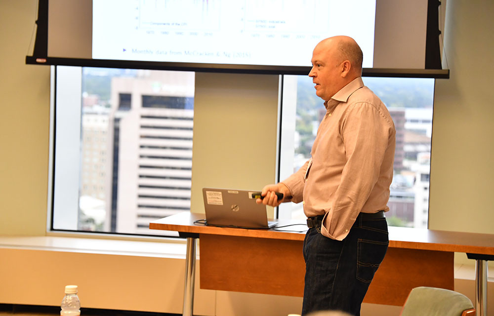 Drew Creal presenting the paper "High Dimensional Block Vector Autoregressions"