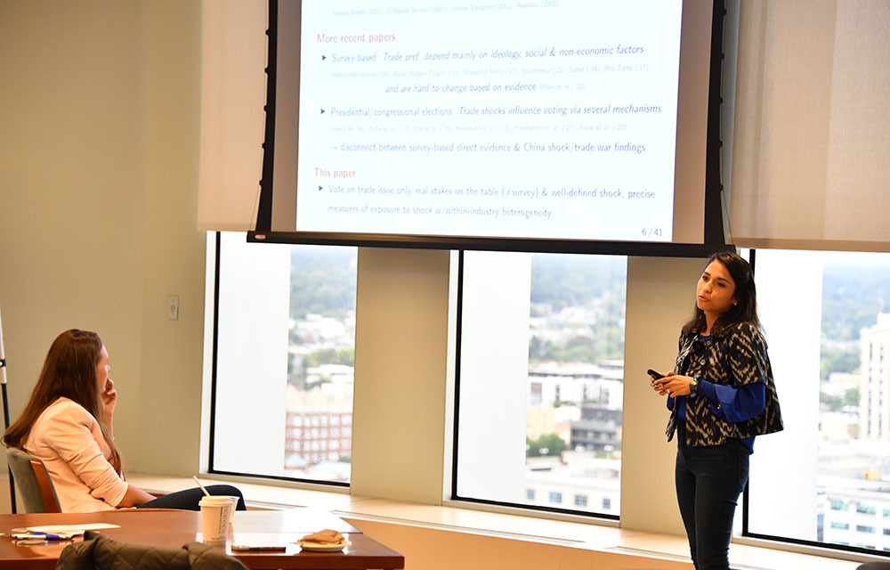 Diana Van Patten presenting the paper “Voting on a Trade Agreement: Firm Networks and Attitudes Toward Openness”