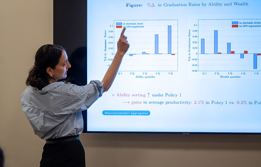 Oliko Vardishvili explaining a projected chart during her CORE Week presentation.