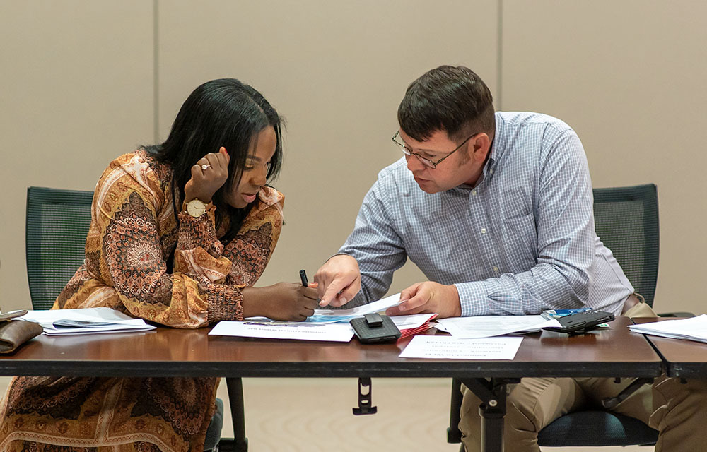 Jason and external partner at the table collaborating