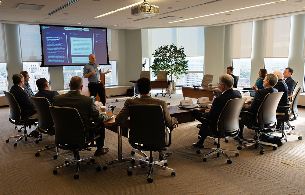 Participants in a Richmond Fed Cyber Sim Lab with IBM