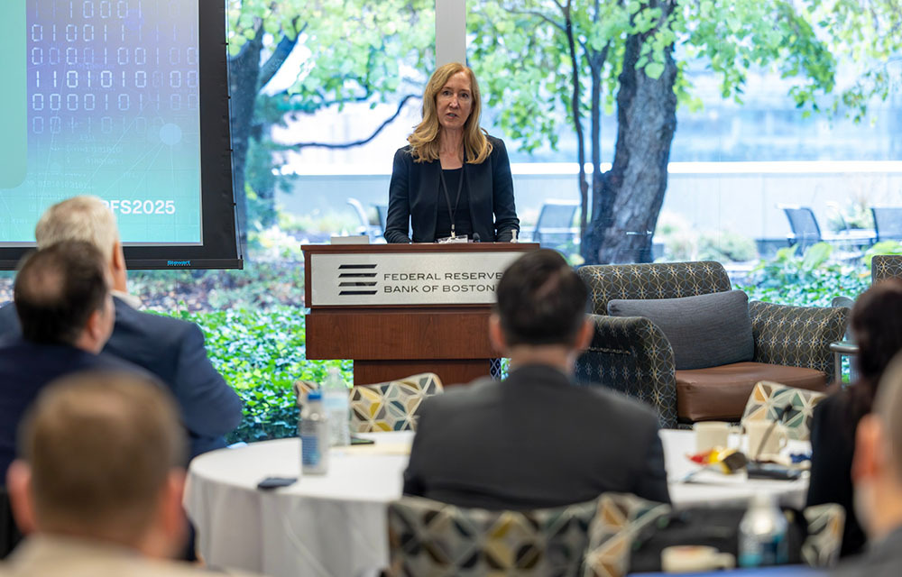 Lisa White speaking at the cyber risk conference in Boston