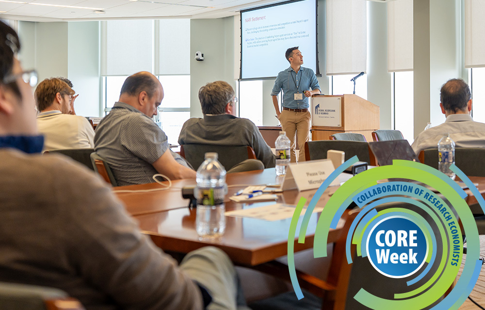 A speaker presenting his paper to fellow economists at CORE Week.