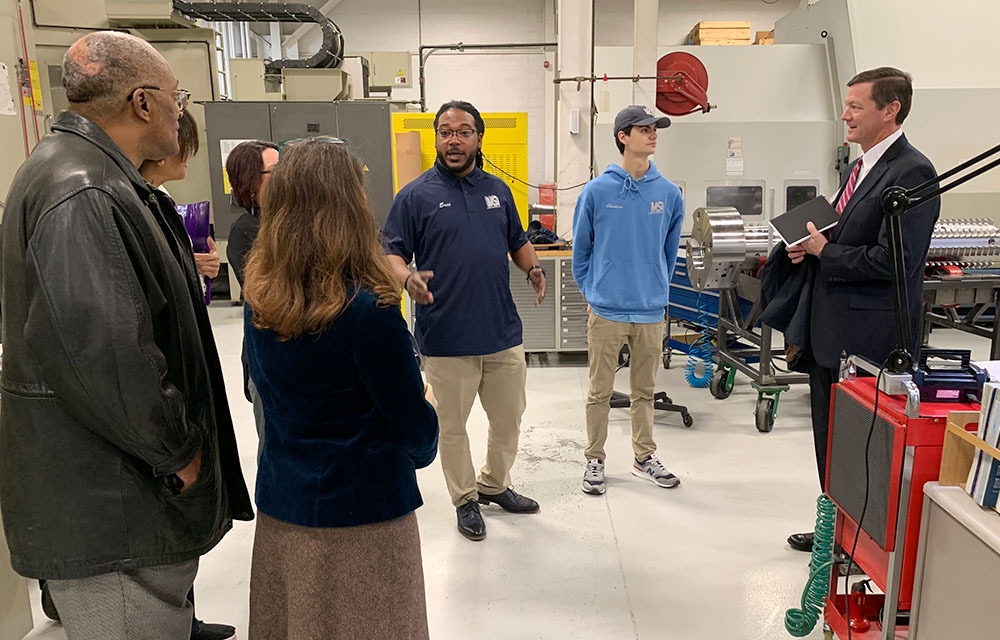 Richmond Fed representatives meet with staff from a manufacturing plant