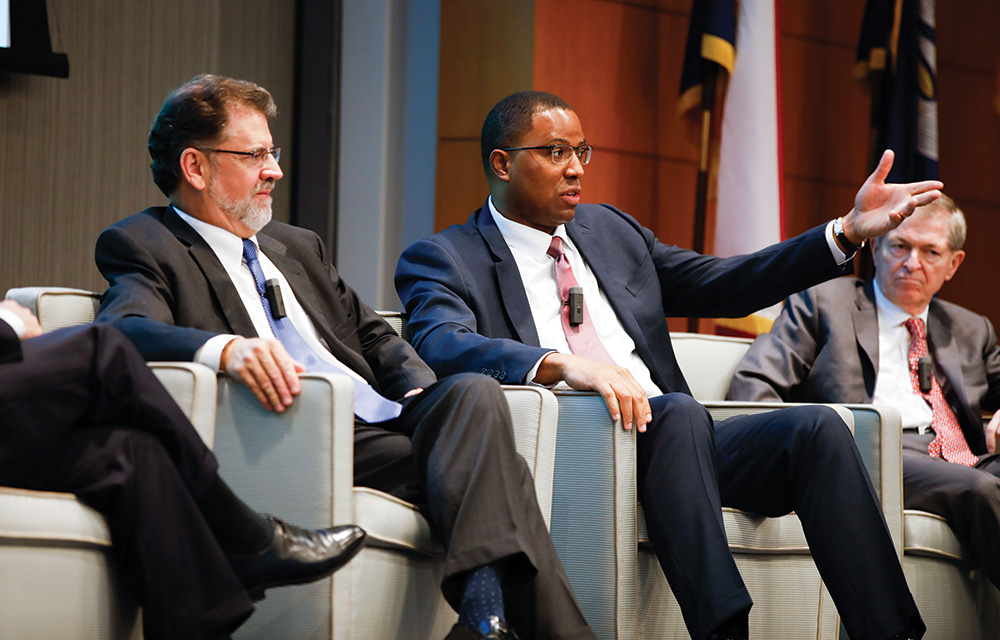 A panel of speakers discussing at the 2018 Technology Enabled Disruption conference