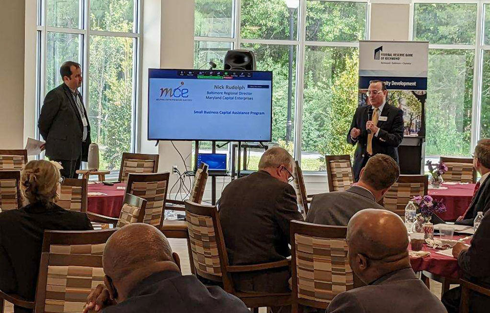 Attendees watch a presenter at an Investment Connection Pitch Session