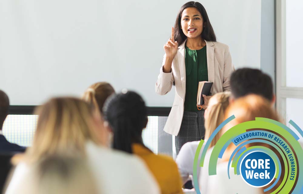 Woman making  a presentation CORE Week logo displays