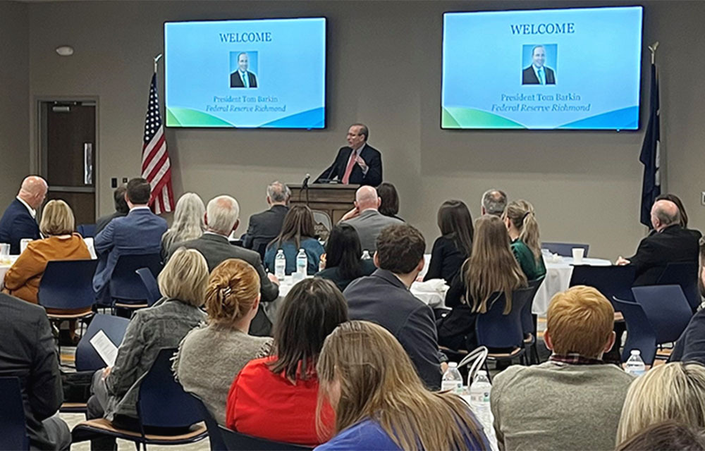 Tom Barking (center) speaking at Community Conversations event in South Carolina in November 2023