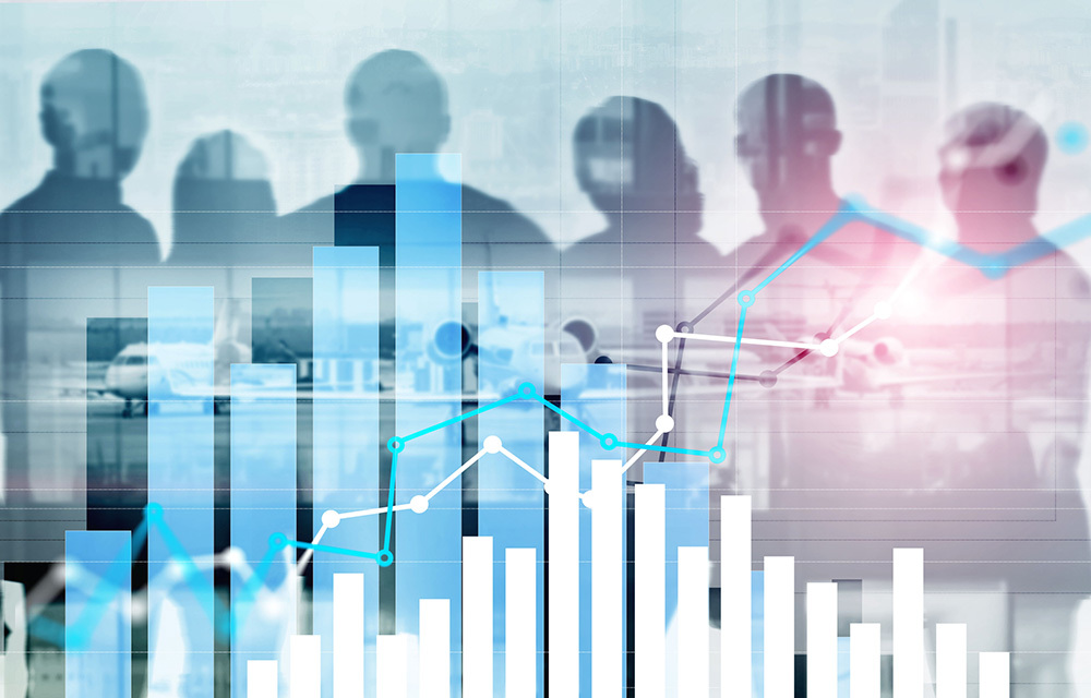 Outlines of people behind line graphs and bar charts of economic data.