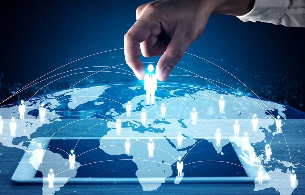 Big hand moving around figures of people on the planet.