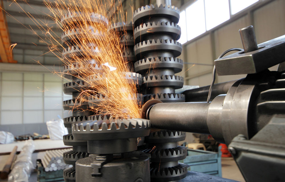 Machining tool grinding a gear
