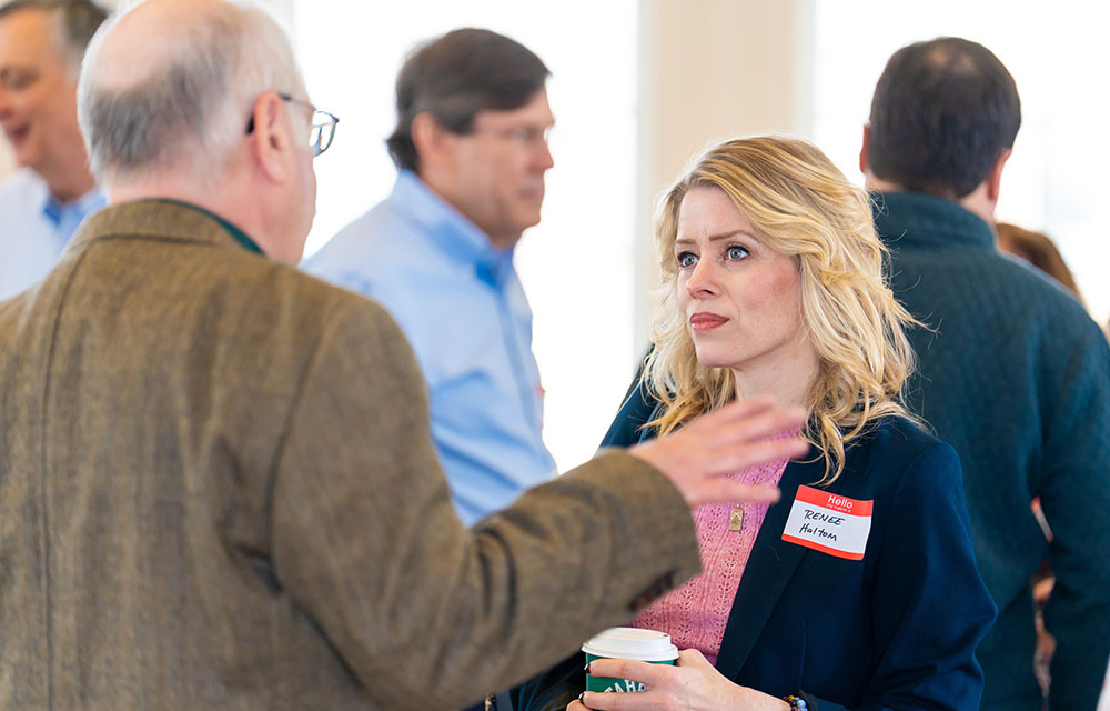 Renee Haltom speaking to business leaders at a recent event