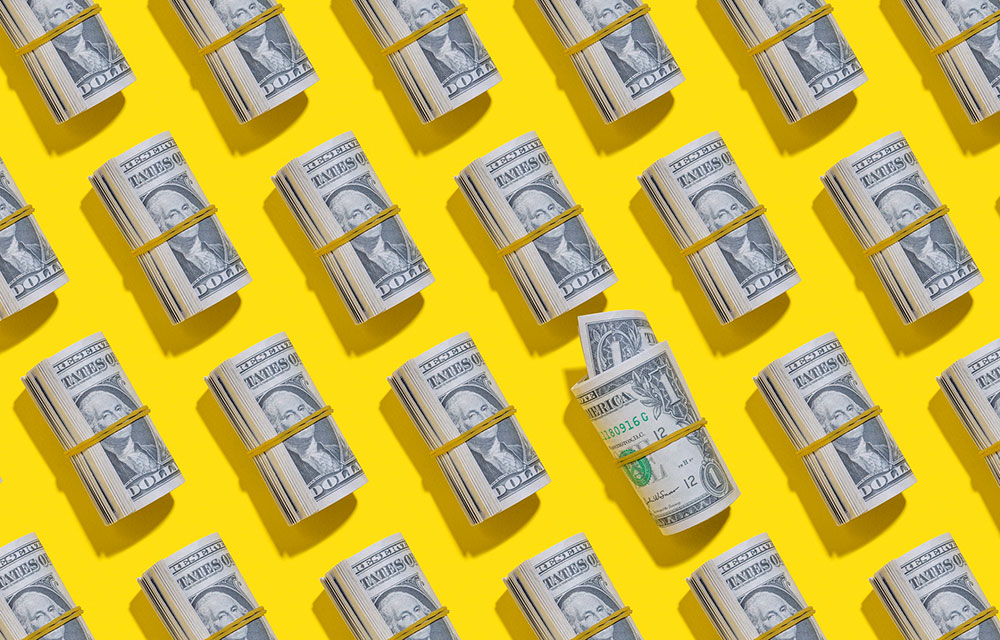 lots and lots of rolls of money