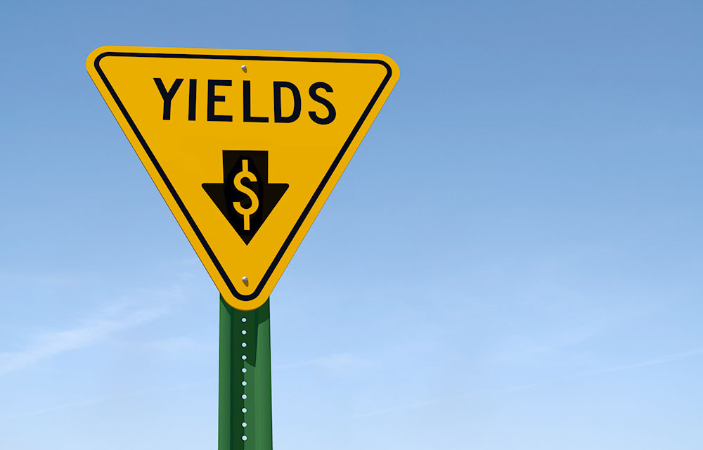 A Yield sign with dollar sign in a down arrow