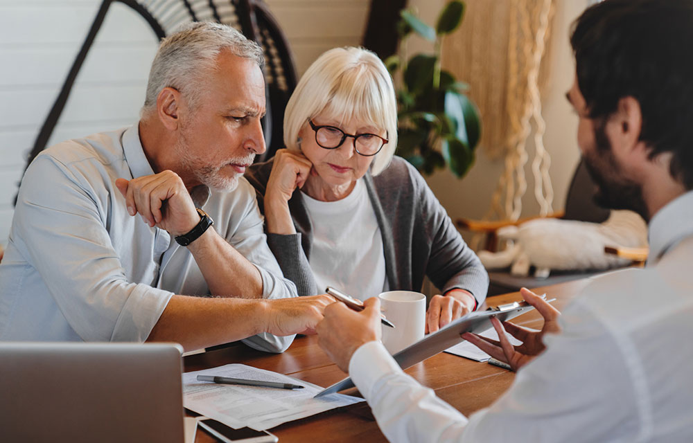 two older people getting advice