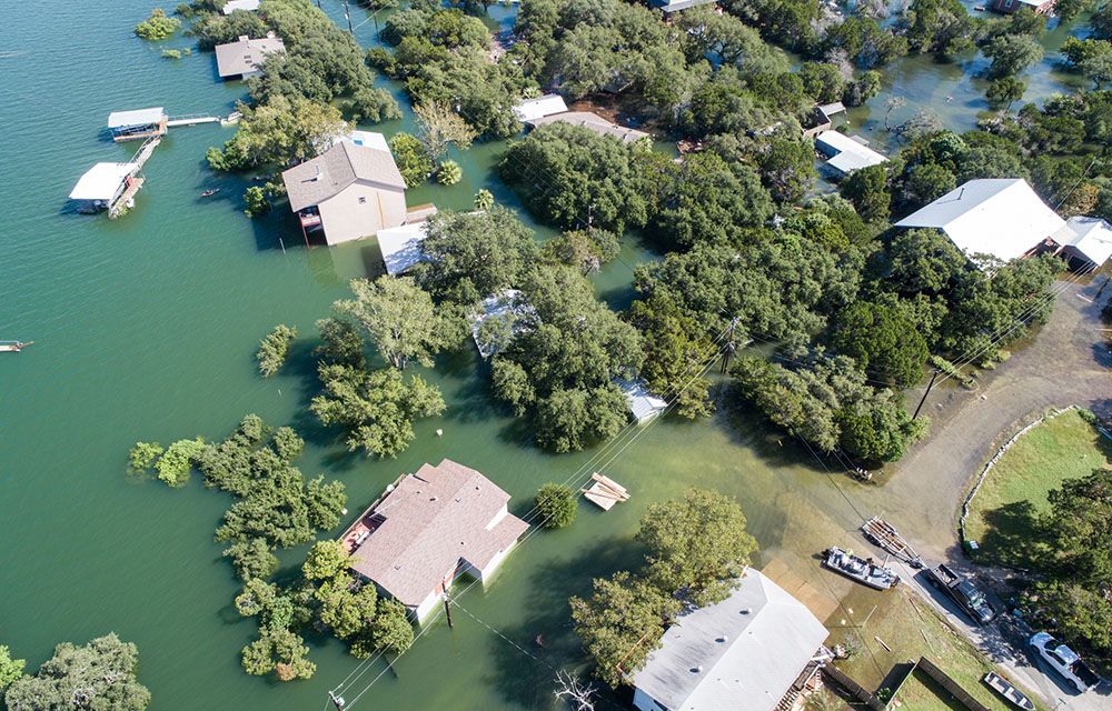 image of a flooded neighborhood to illustrate article on climate change