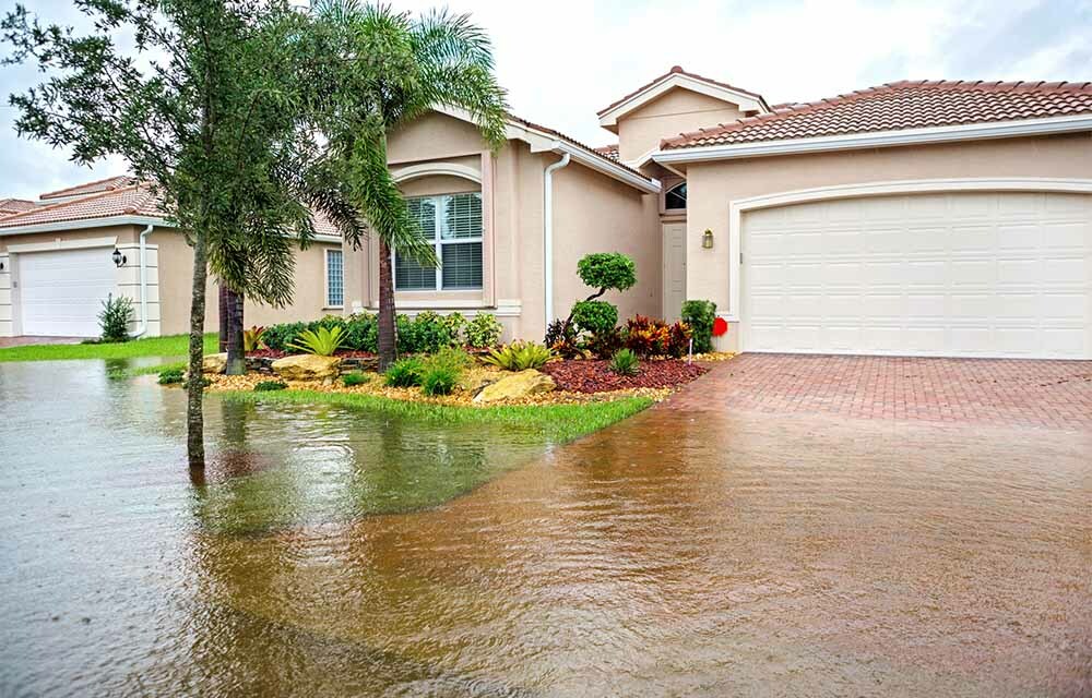 a flooded house illustrating climate change risk