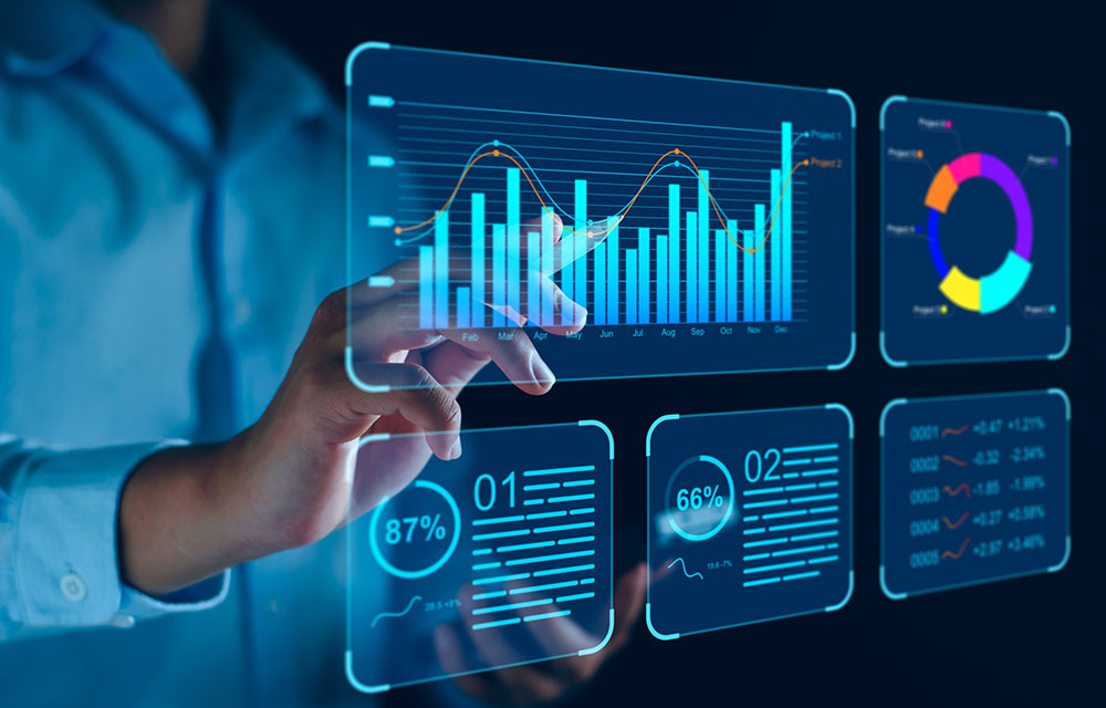 Person interacting with digitalized charts and economic dashboards.