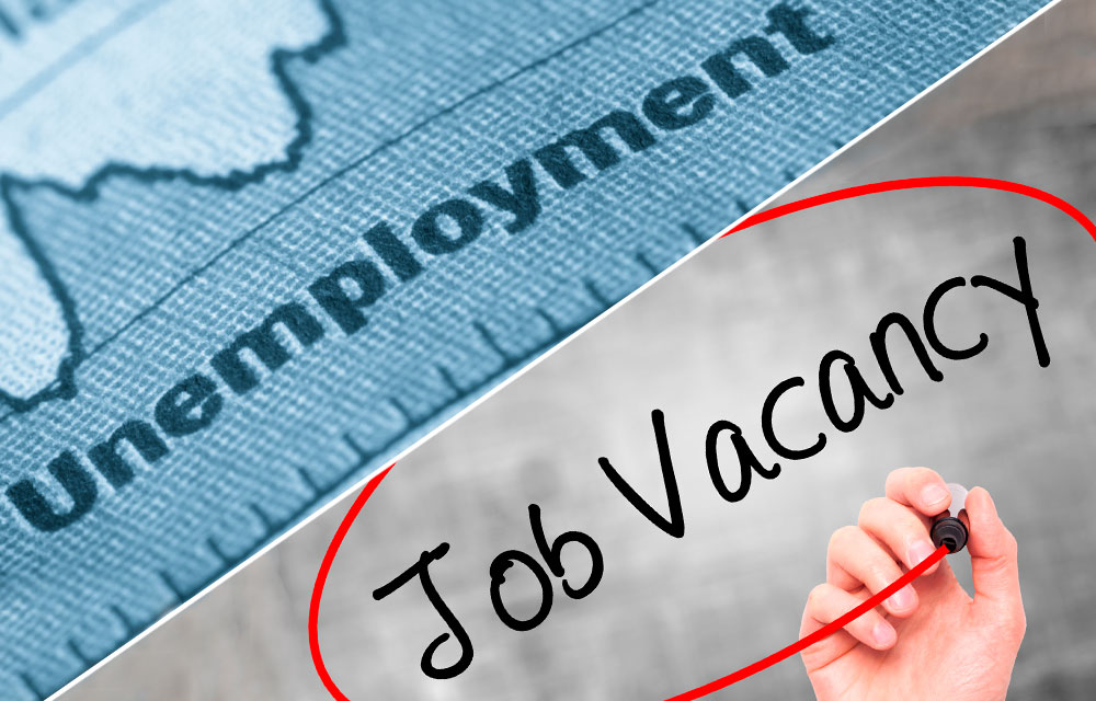 diagonally split image of an unemployment chart and the words "Job Vacancy" circled