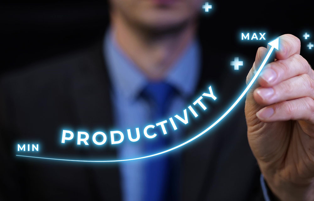 Businessman drawing a rising productivity arrow.