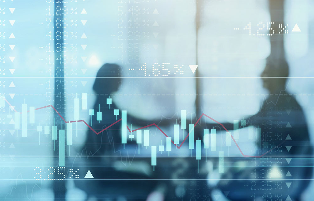 Economic chart showing stock market shifts with a silhouette of business professionals shaking hands behind the chart.