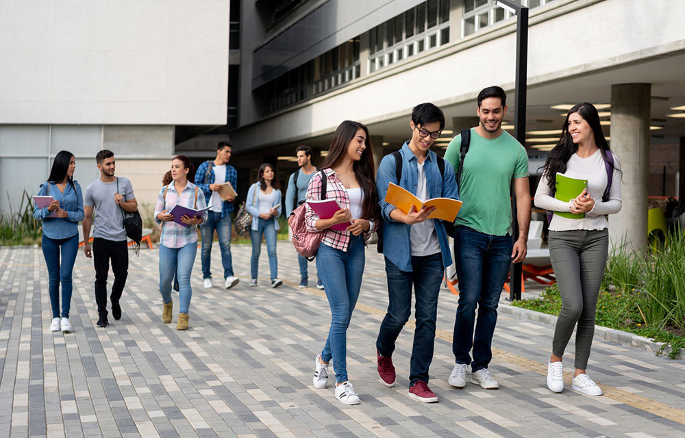 Students walking on campus between classes