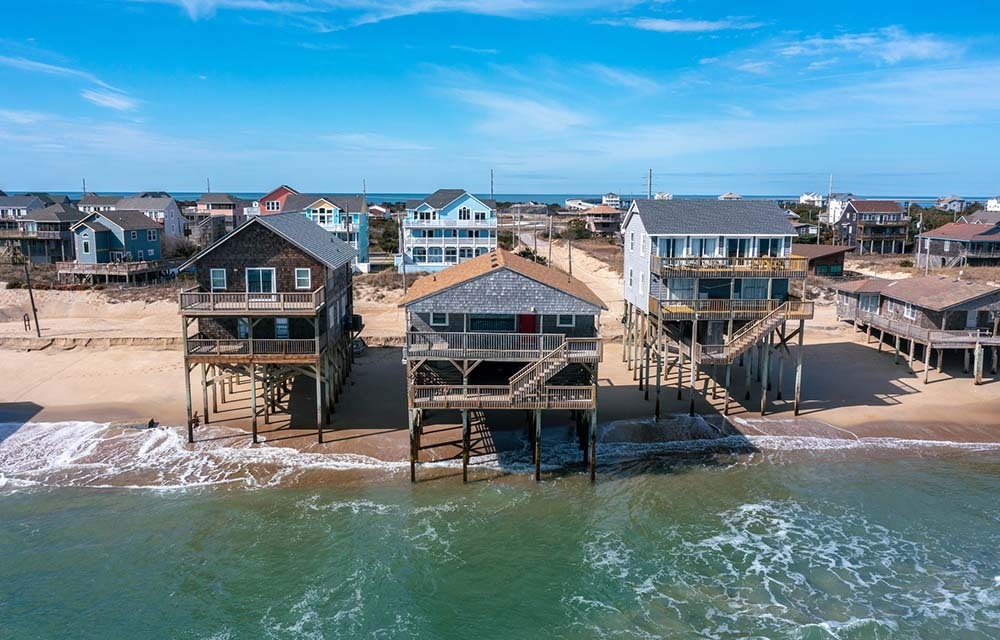 Beachfront homes on a sunny day.