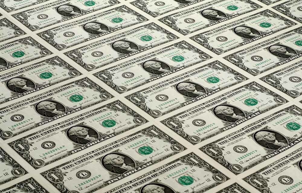 Wall of crisp one-dollar bills.