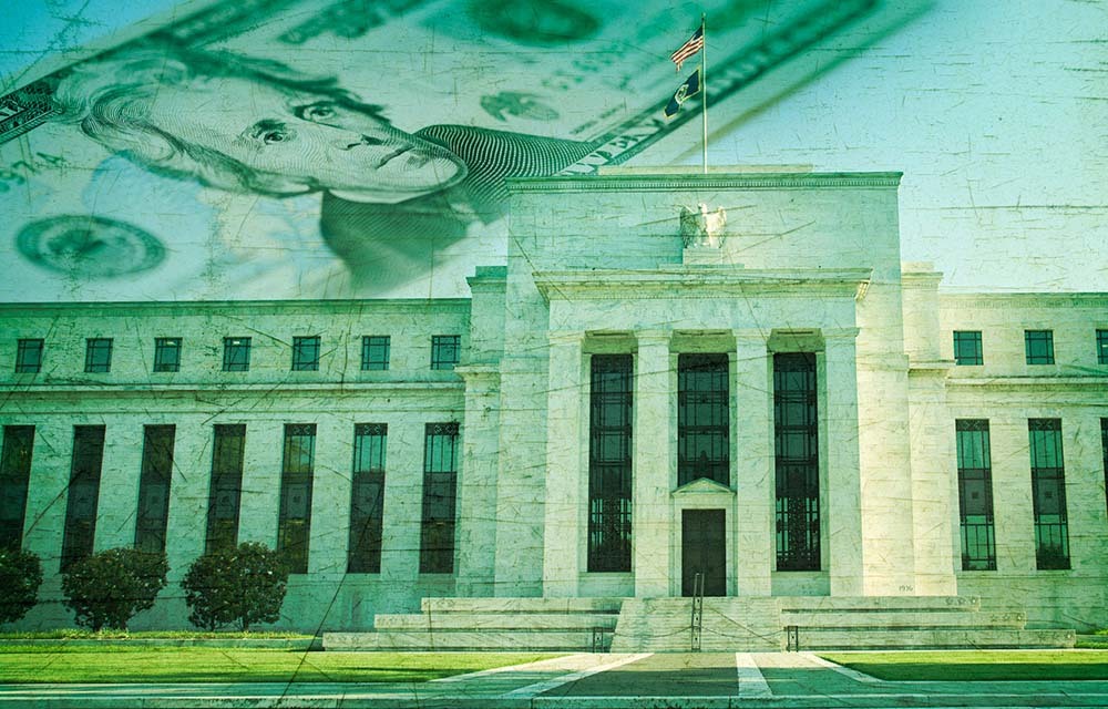 The Federal Reserve building with an overlay of a twenty-dollar bill.