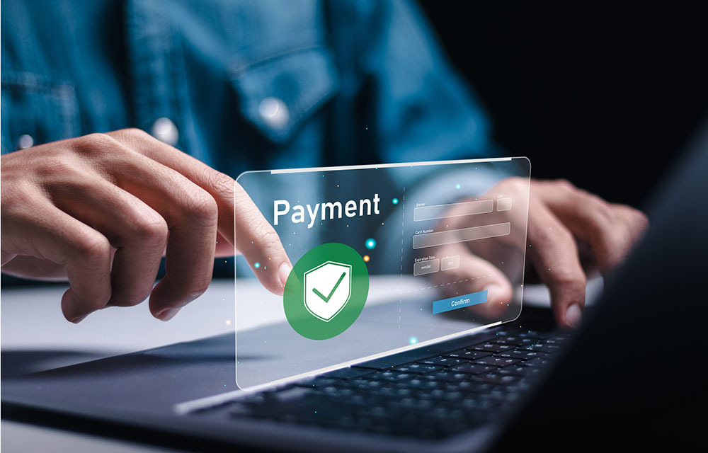 Businessman using laptop to online payment, banking and online shopping.