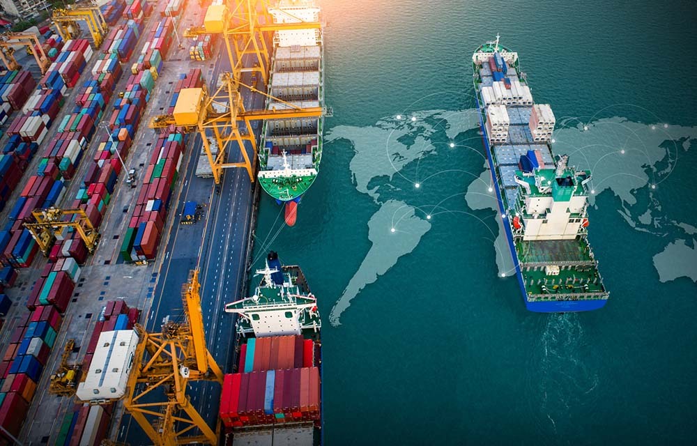 Container ships docking and leaving bay for international transportation.