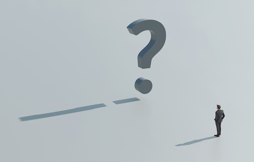 Illustration of a man in a suit looking at a large question mark figure.