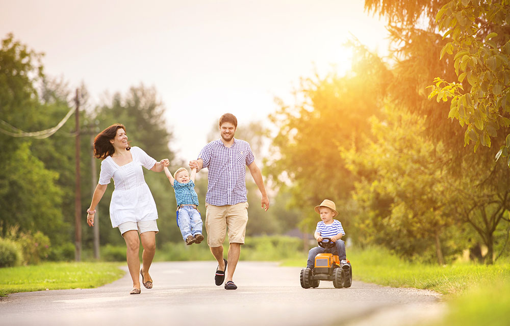 a family playing outdoors