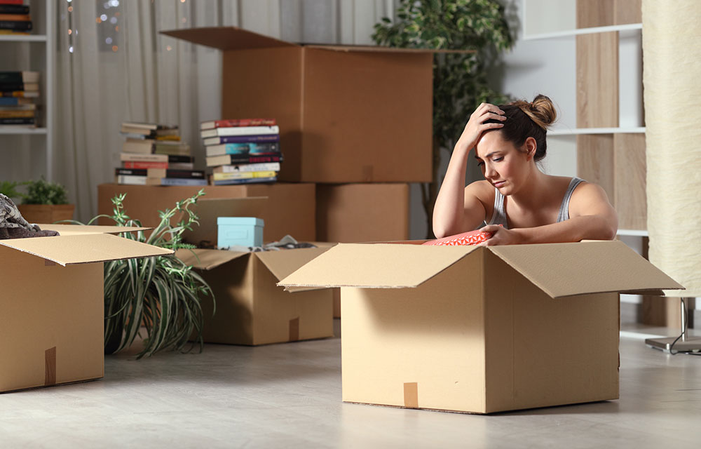 Woman boxing things up for a move