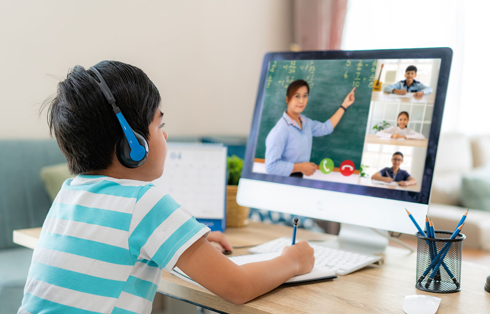 child learning remotely online