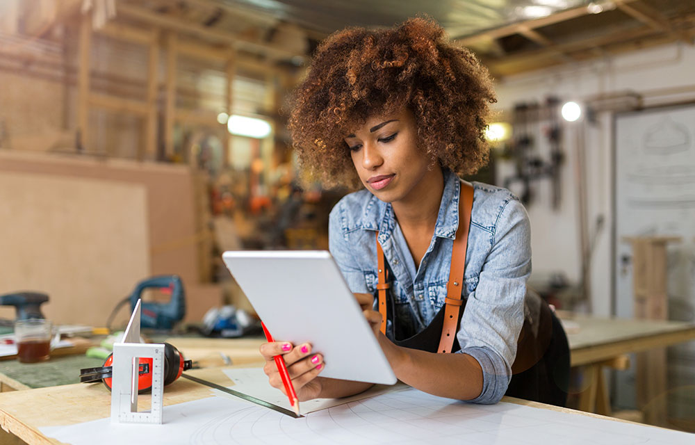 Woman working on her business