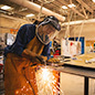 a woman welding