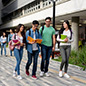 Students walking between classes on a college campus