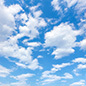 A blue sky and white clouds.